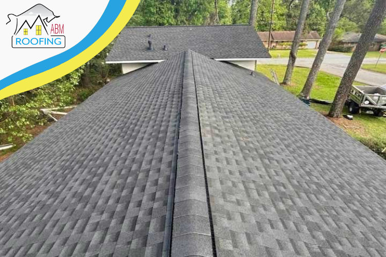 ABM roofer inspecting a roof in Eatonton, GA, amidst fall colors, readying for winter.