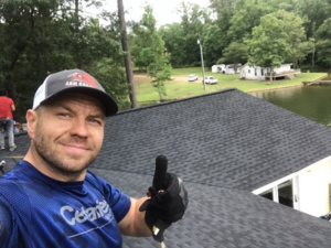 Expert Brookhaven roofer inspecting a newly installed roof for quality assurance