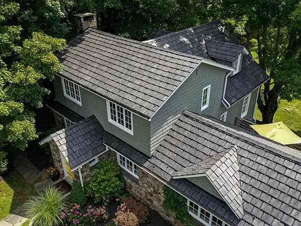 Large home with slate roof